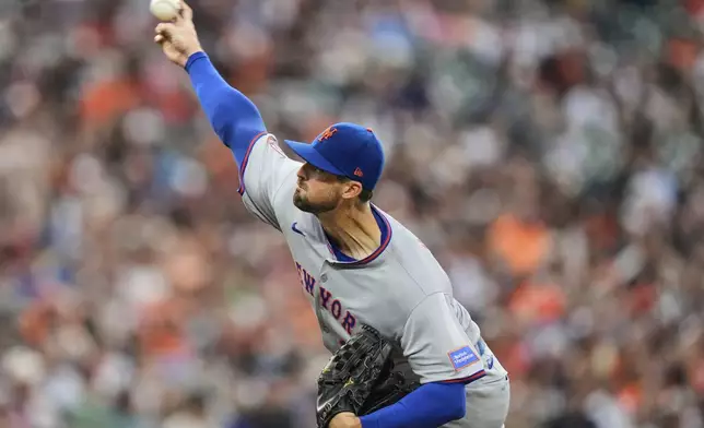 New York Mets starting pitcher Clay Holmes delivers during the first inning of a baseball game against the Baltimore Orioles, Tuesday, July 8, 2025, in Baltimore. (AP Photo/Stephanie Scarbrough)