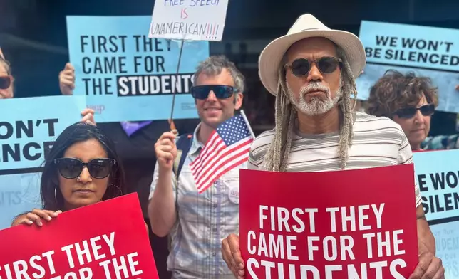 People show their support for a lawsuit challenging the Trump administration's policy of targeting students for deportation who took part in pro-Palestinian demonstrations on Monday, July 7, 2025, at the federal courthouse in Boston. (AP Photo/Michael Casey)