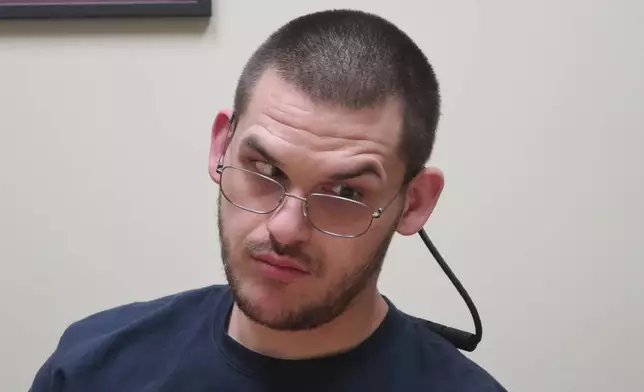 Matthew Hull, a Kansas resident who has cerebral palsy, is interviewed by The Associated Press at the Disability Rights Center in Topeka, Kans., June 18, 2025. (AP Photo/John Hanna)