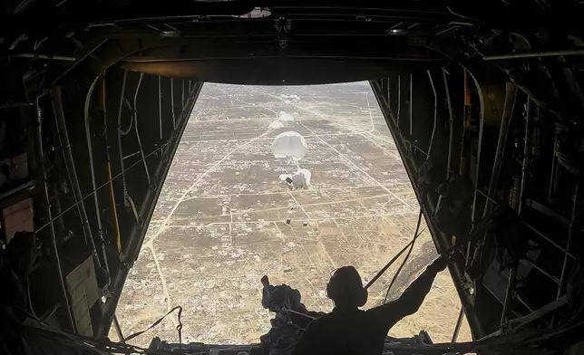 Humanitarian aid destined for Palestinians is airdropped over the Gaza Strip by a Jordanian Air Force aircraft on Tuesday, July 29, 2025. (AP Photo/Malak Harb)