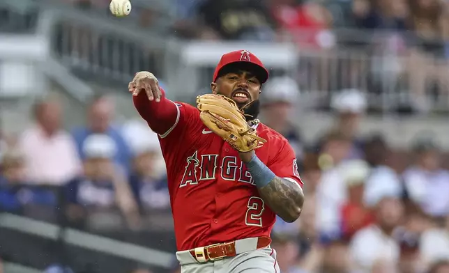 Los Angeles Angels third baseman Luis Rengifo (2) throws to first base in the fourth inning of a baseball game against the Atlanta Braves, Tuesday, July 1, 2025, in Atlanta. (AP Photo/Colin Hubbard)