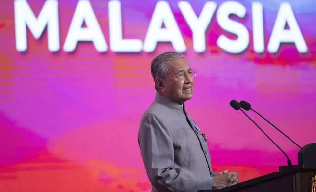 FILE - In this May 9, 2019, photo, Malaysian Prime Minister Mahathir Mohamad, speaks during a press conference in Putrajaya, Malaysia. (AP Photo/Vincent Thian, File)
