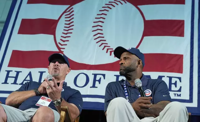 Baseball Hall of Fame inductees Billy Wagner, left, and CC Sabathia speak to reporters during a news conference in Cooperstown, N.Y., Saturday, July 26, 2025. (AP Photo/Seth Wenig)