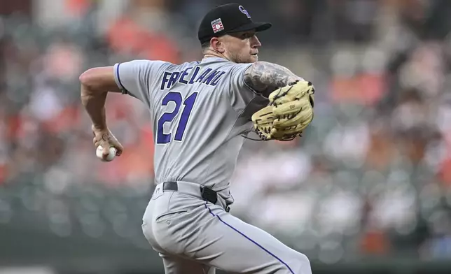 Colorado Rockies pitcher Kyle Freeland throws during the first inning of a baseball game against the Baltimore Orioles in Baltimore, Friday, July 25, 2025. (AP Photo/Terrance Williams)