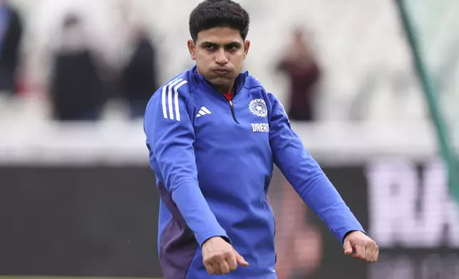 India's captain Shubman Gill warms up before the start of play on day five of the second cricket test match between England and India at Edgbaston in Birmingham, England, Sunday, July 6, 2025. (AP Photo/Scott Heppell)