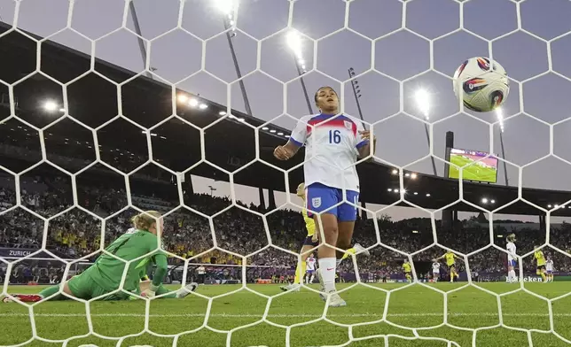 England's Jess Carter reacts after Sweden's Stina Blackstenius scored her sides second goal during the Women's Euro 2025 quarterfinals soccer match between Sweden and England at Stadion Letzigrund in Zurich, Switzerland, Thursday, July 17, 2025. (AP Photo/Martin Meissner)