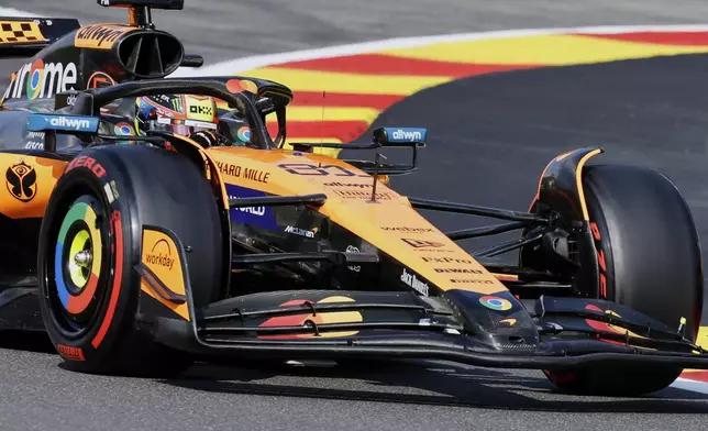 McLaren driver Oscar Piastri of Australia steers his car during the sprint qualification ahead of the Formula One Grand Prix at the Spa-Francorchamps racetrack in Spa, Belgium, Friday, July 25, 2025. (AP Photo/Geert Vanden Wijngaert)