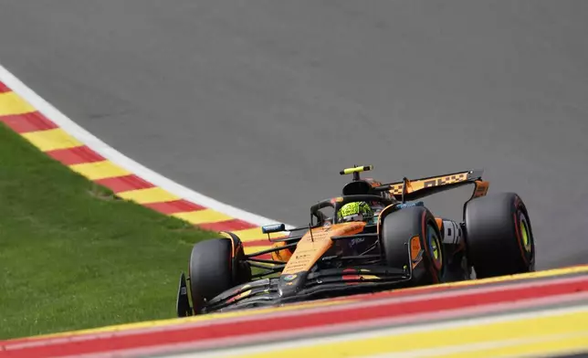 McLaren driver Lando Norris of Britain steers his car during qualification ahead of the Formula One Grand Prix at the Spa-Francorchamps racetrack in Spa, Belgium, Saturday, July 26, 2025. (AP Photo/Geert Vanden Wijngaert)