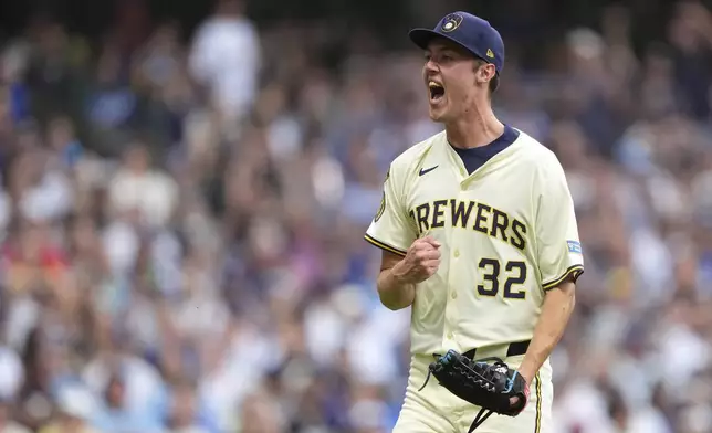 Milwaukee Brewers' Jacob Misiorowski reacts after striking out Los Angeles Dodgers' Freddie Freeman during the third inning of a baseball game Tuesday, July 8, 2025, in Milwaukee. (AP Photo/Aaron Gash)