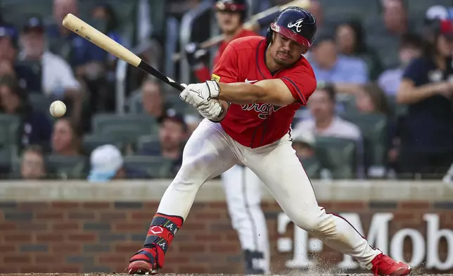 Atlanta Braves' Drake Baldwin hits an RBI single in the fourth inning of a baseball game against the New York Yankees, Friday, July 18, 2025, in Atlanta. (AP Photo/Colin Hubbard)