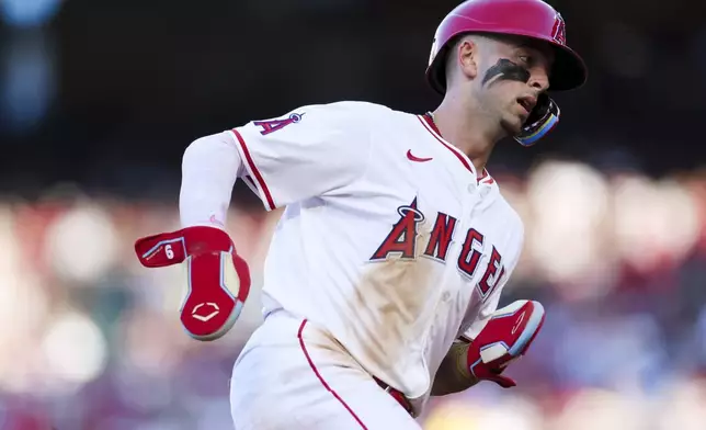 Los Angeles Angels' Zach Neto runs the bases during the first inning of a baseball game against the Seattle Mariners, Friday, July 25, 2025, in Anaheim, Calif. (AP Photo/Eric Thayer)