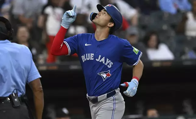 Toronto Blue Jays' Joey Loperfido celebrates after hitting a solo home run during the fifth inning of a baseball game against the Chicago White Sox, Monday, July 7, 2025, in Chicago. (AP Photo/Paul Beaty)