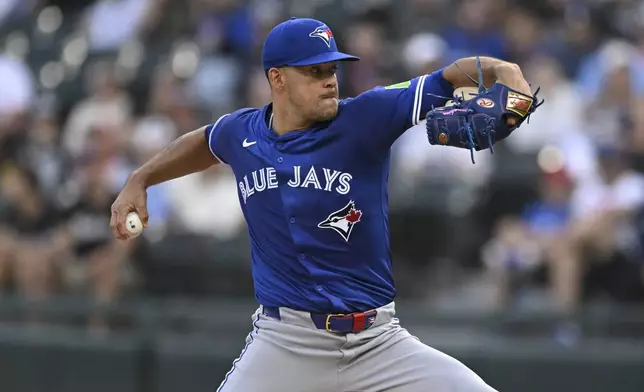 Toronto Blue Jays starter Jose Berrios delivers a pitch during the first inning of a baseball game against the Chicago White Sox, Monday, July 7, 2025, in Chicago. (AP Photo/Paul Beaty)