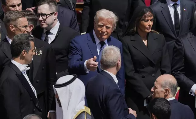 FILE - President Donald Trump, center, gives the thumbs up at the end of the funeral of Pope Francis in St. Peter's Square at the Vatican, April 26, 2025. (AP Photo/Gregorio Borgia, File)