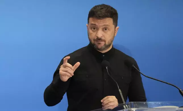 Ukraine's President Volodymyr Zelenskyy speaks with reporters during the Ukraine Recovery Conference at La Nuvola convention center in Rome, Thursday, July 10, 2025. (AP Photo/Gregorio Borgia)