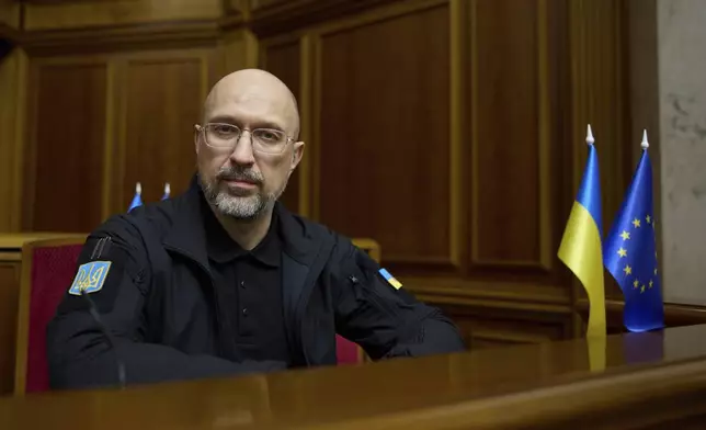 Ukraine's newly elected Defense Minister Denys Shmyhal speaks at the parliament session hall in Kyiv, Ukraine Thursday, July 17, 2025. (AP Photo/Vadym Sarakhan)