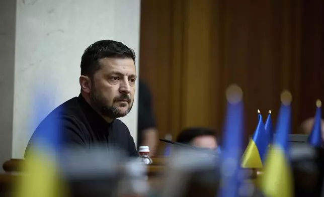 President of Ukraine Volodymyr Zelenskyy attends the parliament session in Kyiv, Ukraine Thursday, July 17, 2025. (AP Photo/Vadym Sarakhan)