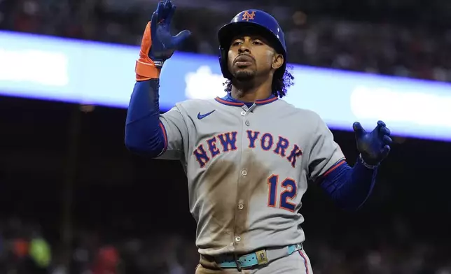 New York Mets' Francisco Lindor celebrates after hitting a solo home run during the third inning of a baseball game against the San Francisco Giants, Friday, July 25, 2025, in San Francisco. (AP Photo/Godofredo A. Vásquez)