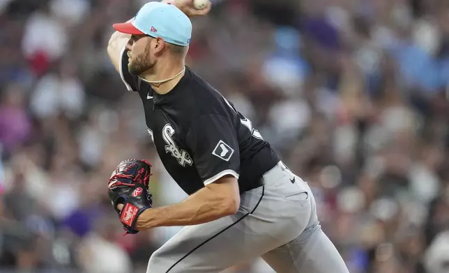 Chicago White Sox starting pitcher Adrian Houser works against the Colorado Rockies in the eighth inning of a baseball game Friday, July 4, 2025, in Denver. (AP Photo/David Zalubowski)