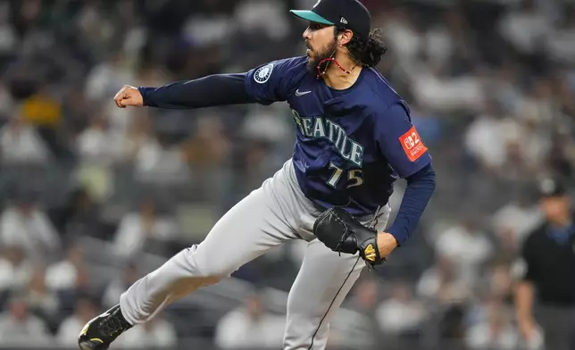 Seattle Mariners pitcher Andrés Muñoz (75) throws during the ninth inning of a baseball game against the New York Yankees, Thursday, July 10, 2025, in New York. (AP Photo/Yuki Iwamura)