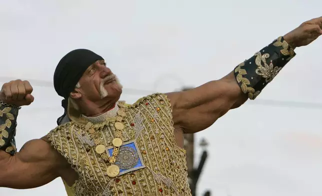 FILE - Actor Hulk Hogan poses on his float during the Krewe of Bacchus Mardi Gras parade in New Orlean, Feb. 3, 2008, the weekend before Fat Tuesday. (AP Photo/Alex Brandon, File)