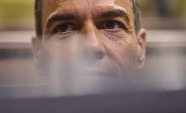Spanish Prime Minister Pedro Sánchez looks on as he sits in the Spanish parliament in Madrid, Wednesday, July 9, 2025. (AP Photo/Bernat Armangue)
