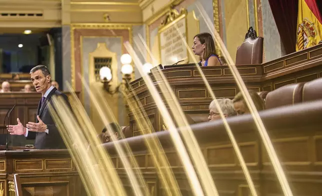 Spanish Prime Minister Pedro Sánchez gives a speech at the Spanish parliament in Madrid, Wednesday, July 9, 2025. (AP Photo/Bernat Armangue)
