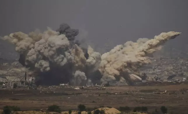 Smoke rises to the sky following an Israeli army bombardment in the northern Gaza Strip, as seen from southern Israel, Thursday, July 10, 2025. (AP Photo/Leo Correa)