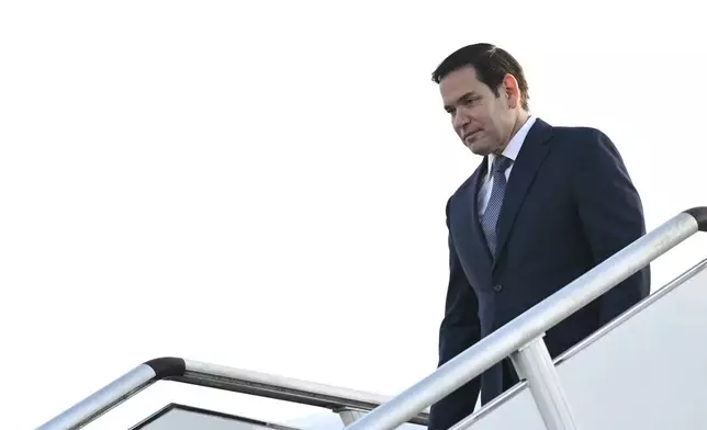 U.S. Secretary of State Marco Rubio, front, arrives at Subang Air Base, outside of Kuala Lumpur Thursday, July 10, 2025. Rubio arrived in Malaysia to attend the ASEAN Foreign Ministers' Meeting. (Mandel Ngan/Pool Photo via AP)