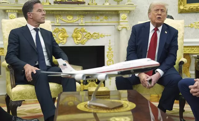 President Donald Trump, right, meets with NATO Secretary General Mark Rutte in the Oval Office of the White House, Monday, July 14, 2025, in Washington. (AP Photo/Evan Vucci)