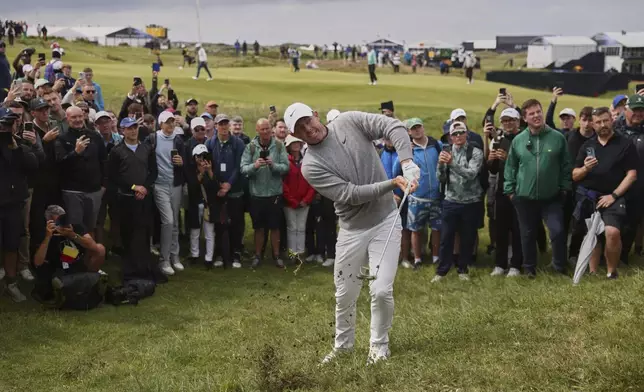 Rory McIlroy of Northern Ireland chips out of the rough on the 2nd hole during the first round of the British Open golf championship at the Royal Portrush Golf Club, Northern Ireland, Thursday, July 17, 2025. (AP Photo/Peter Morrison)