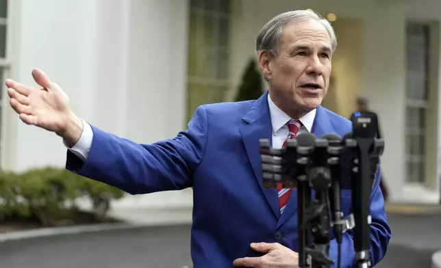 FILE - Texas Gov. Greg Abbott speaks to reporters outside the West Wing of the White House, Feb. 5, 2025, in Washington. (AP Photo/Alex Brandon, File)