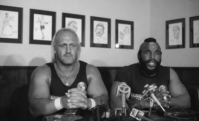 FILE - World Wrestling Federation heavyweight champion Hulk Hogan, left, and Mr. T. appear at a news conference on March 18, 1985, in New York's Madison Square Garden. (AP Photo/Corey Struller, File)