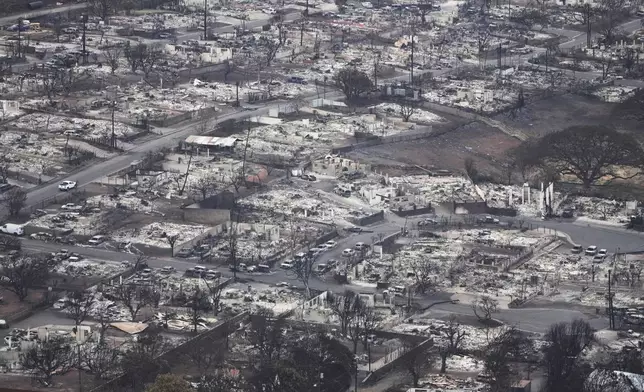 FILE - Wildfire wreckage is seen on Aug. 10, 2023, in Lahaina, Hawaii. (AP Photo/Rick Bowmer, File)