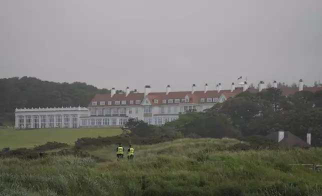 Police guard the Trump Turnberry golf course in Turnberry, Scotland, Friday, July 25, 2025, ahead of President Trump's visit Scotland. (AP Photo/Alastair Grant)