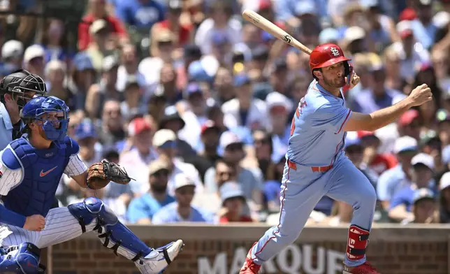 St. Louis Cardinals' Thomas Saggese watches his 2-RBI single during the first inning of a baseball game against the Chicago Cubs Saturday, July 5, 2025, in Chicago. (AP Photo/Paul Beaty)