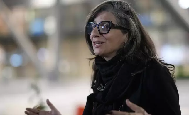 U.N. Special Rapporteur for the Occupied Palestinian Territories Francesca Albanese talks to The Associated Press at the Sarajevo airport in Sarajevo, Bosnia and Herzegovina, Thursday, July 10, 2025, on her way to events commemorating the 30th anniversary of the Srebrenica genocide. (AP Photo/Darko Bandic)