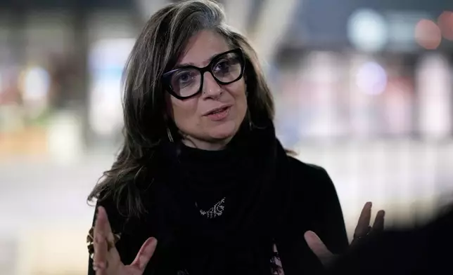 U.N. Special Rapporteur for the Occupied Palestinian Territories Francesca Albanese talks to The Associated Press at the Sarajevo airport in Sarajevo, Bosnia and Herzegovina, Thursday, July 10, 2025, on her way to events commemorating the 30th anniversary of the Srebrenica genocide. (AP Photo/Darko Bandic)