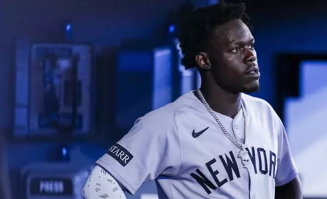 New York Yankees' Jazz Chisholm Jr. looks on from the dugout after a baseball game against the Toronto Blue Jays in Toronto, Thursday, July 3, 2025. (Thomas Skrlj/The Canadian Press via AP)