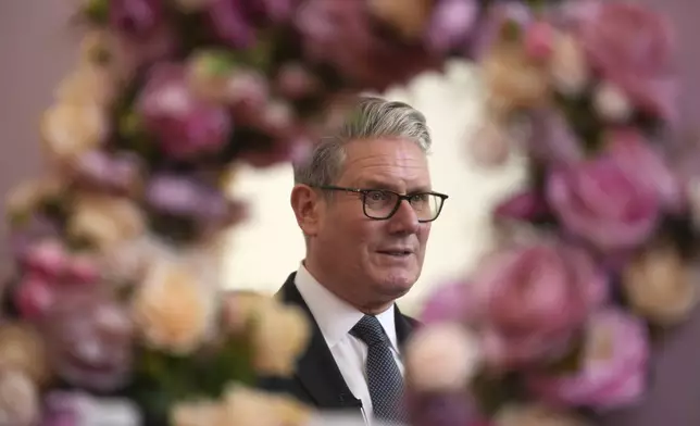 Britain's Prime Minister Keir Starmer is reflected in a mirror during a business showcase event whilst meeting Prime Minister Narendra Modi of India at Chequers near Aylesbury, England, Thursday, July 24, 2025.(AP Photo/Kin Cheung, Pool)