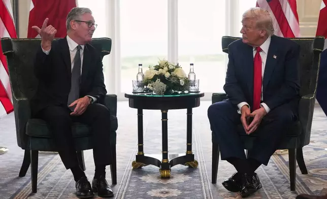 President Donald Trump meets with Britain's Prime Minister Keir Starmer, left, at Trump Turnberry golf club on Monday, July 28, 2025 in Turnberry, Scotland. (Christopher Furlong/Pool Photo via AP)