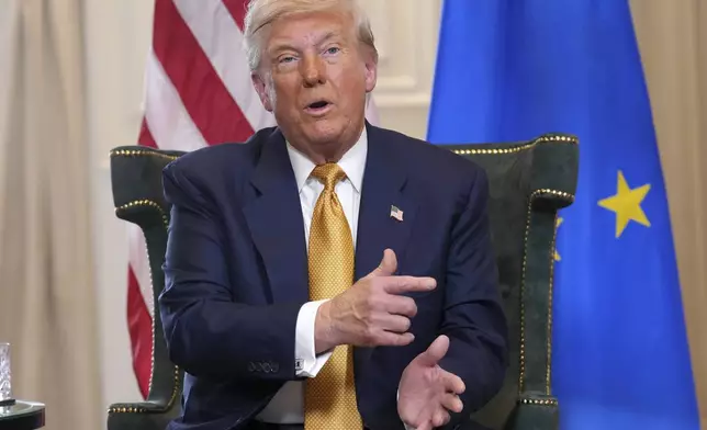 President Donald Trump gestures as he meets European Commission President Ursula von der Leyen at the Trump Turnberry golf course in Turnberry, Scotland Sunday, July 27, 2025. (AP Photo/Jacquelyn Martin)