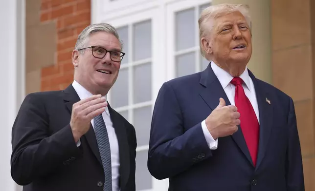 President Donald Trump meets with Britain's Prime Minister Keir Starmer, left, at Trump Turnberry golf club on Monday, July 28, 2025 in Turnberry, Scotland. (Christopher Furlong/Pool Photo via AP)