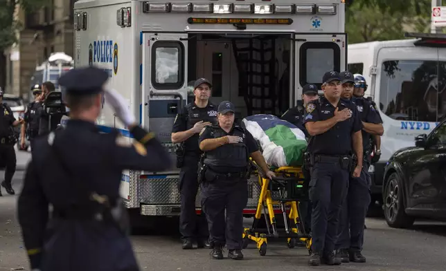 The casket of NYPD Officer Didarul Islam arrives at Parkchester Jame Masjid after Monday's deadly shooting, Tuesday, July 29, 2025, in New York. (AP Photo/Yuki Iwamura)