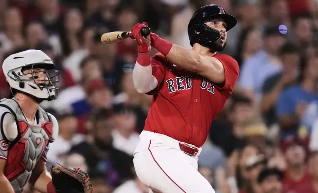 Boston Red Sox's Wilyer Abreu watches the flight of his two-run home run off Cincinnati Reds pitcher Nick Martinez during the sixth inning of a baseball game at Fenway Park, Wednesday, July 2, 2025, in Boston. (AP Photo/Charles Krupa)