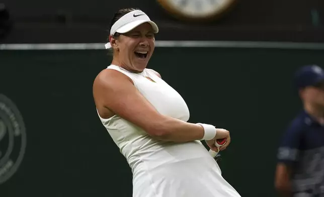 Amanda Anisimova of the U.S. reacts during her women's singles fourth round match against Linda Noskova of Czech Republic at the Wimbledon Tennis Championships in London, Sunday, July 6, 2025.(AP Photo/Joanna Chan)