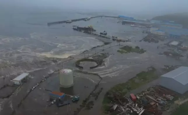 This image taken from a video released by Geophysical Service of the Russian Academy of Sciences, shows the aftermath of tsunami hitting the coastal area of Severo-Kurilsk at Paramushir island of Kuril Islands, Russia, Wednesday, July 30, 2025. (Geophysical Service of the Russian Academy of Sciences via AP)