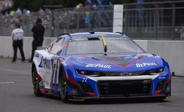 Driver Michael McDowell (71) drives in a NASCAR Cup Series auto race at the Grant Park 165 , Sunday, July 6, 2025, in Chicago. (AP Photo/Erin Hooley)