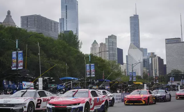 Drivers race in a NASCAR Cup Series auto race at the Grant Park 165 , Sunday, July 6, 2025, in Chicago. (AP Photo/Erin Hooley)