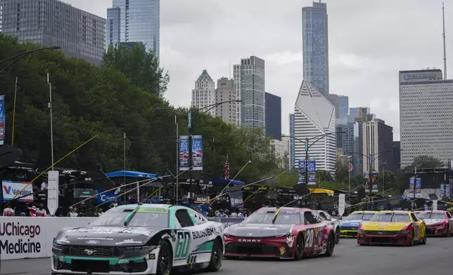 Drivers race in a NASCAR Cup Series auto race at the Grant Park 165 , Sunday, July 6, 2025, in Chicago. (AP Photo/Erin Hooley)